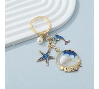 Shein Colección de estilo bohemio del océano con llavero de concha, estrella de mar, delfín, perla falsa, accesorio para bolso, regalo, recuerdo, accesorio