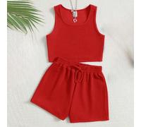 Shein Conjunto casual de niña preadolescente con top de cuello redondo holgado y textura de punto, y shorts