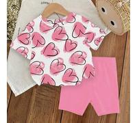 Shein Conjunto de blusa de manga corta con cuello redondo y estampa de corazones y shorts de unicolor para bebé niña