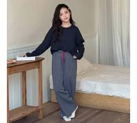 Shein Conjunto de pijama de niña preadolescente con parte superior de manga larga holgada de un solo color y pantalones estampados a rayas, para primavera/o