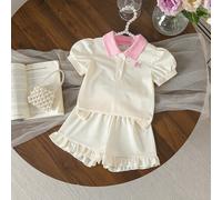 Shein Conjunto de ropa casual de verano para niñas bebé, camiseta de manga corta con cuello polo y bordado de lazo, top de manga abullonada y shorts con vol