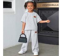 Shein Conjunto informal de niña de sudadera de manga media con hombros caídos y parches y pantalón de chándal plisado de 2 piezas, ideal para volver al cole