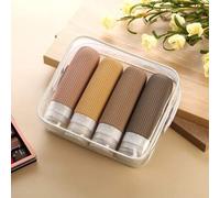 Shein Esenciales de viaje Conjunto de 4 piezas para cosméticos Traje de viaje Loción Champú Gel de ducha Botella de manguera Botella de macaron Botella expr