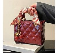 Shein Este año, la bolsa de moda para damas 2025 es un nuevo bolso de alta gama de moda, de Dai Feibao, que se puede colgar sobre un hombro para ir al traba