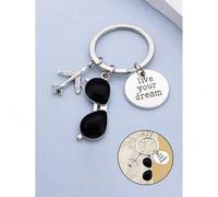 Shein Este llavero presenta la cita del piloto "Vive tu sueño" como tema principal, decorado con patrones de avión y gafas de sol de viaje. Hecho de aleació