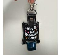 Shein Estuche de inhalador de PU negro con llavero y bordado "No es fácil ser sibilante" - Funda protectora portátil para dispensador de inhalador de asma e