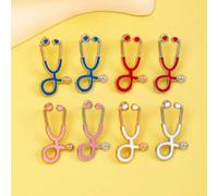 Shein Juego de 14 piezas de broches con diseño de estetoscopio de dibujos animados y coloridos, accesorios decorativos de metal con insignia médica creativa