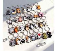 Shein Juego de llaveros de gato de dibujos animados de PVC, colgante de gato lindo de goma suave, múltiples formas de gato de colores con patas de gato, esp