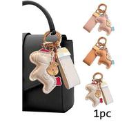 Shein Llavero colgante con diseño de caballo decorativo,encantador accesorio de pareja para bolsos, método de tejido no textil, sin metal precioso chapado,