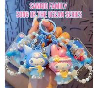 Shein Llavero con cierre de pulsera de personajes kawaii de Sanrio - Kuromi My Melody Song of the Ocean Series, abalorio de perla para bolso con detalle de