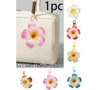Shein Llavero con dije de bolsa de playa de estilo bohemio Plumeria de estilo Kawaii (6 estilos para elegir), un lindo dije de bolsa adecuado para adolescen