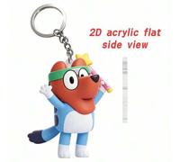 Shein Llavero de aventura de ciclismo 2D con temática de Bluey, que presenta al querido perro azul montando una bicicleta colorida con un casco de estrella