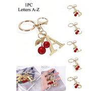 Shein Llavero elegante premium con letra dorada, colgante de letra 3D de la A a la Z, adorno de cereza, llavero de aleación de moda, decoración colgante par
