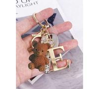 Shein Llavero elegante premium con letra dorada y colgante de osito de peluche, colgante de letra 3D de la A a la Z, anillo de llavero de aleación de moda,