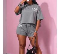 Shein Nuevo conjunto de dos piezas para mujer talla grande de primavera/verano: estilo casual de calle, camiseta de manga corta con cuello redondo y estampa
