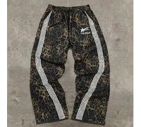 Shein Pantalón de chándal con estampado gráfico de leopardo de la jungla de estilo callejero de moda Y2K para hombres, un artículo imprescindible para el ot