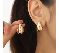 Shein Pendientes de aleación de zinc con diseño hueco brillante con forma de coma y lágrima, estilo punk, al estilo europeo y americano, en color dorado cla