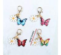 Shein Set de 12 llaveros mini lindos con mariposas y margaritas de colores, pendientes para bolsos, cadenas para bolsos, adornos para bolsos, diseño con tem