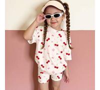 Shein Set de 2 piezas con camiseta de manga corta de cuello redondo con estampado de cerezas, flores y lazos, y shorts ciclistas ajustados para niña, estilo