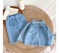 Shein Set de 2 piezas de top vaquero azul desgastado casual y suelto con dobladillo elástico y pantalones vaqueros sueltos y relajados con tiro bajo para ni