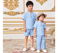 Shein Set de 2 piezas para bebé/niño pequeño con top de manga corta holgado y cuello alto con media abertura, y pantalones holgados tejidos, en estilo corea