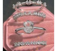 Shein Set de 4 anillos apilables elegantes, incrustados con circonita cúbica en forma de lágrima y símbolos rectangulares brillantes, que simbolizan el roma