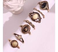 Shein Set de 7 anillos de mujer dorados de metal con diseño floral hueco grabado y piedras preciosas falsas en montura