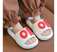 Shein Un par de zapatillas infantiles suaves, antideslizantes, ligeras y cómodas con diseños de letras y patrones de dibujos animados, ideales para el veran