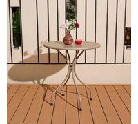 Shein Una pequeña mesa redonda en el balcón exterior, una mesa de café para una conversación informal y una mesa de comedor sencilla en el patio de una popu