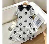 Shein Vestido de niña de color blanco crema, con un gran cuello Peter Pan negro que le da un toque retro y dulce, con un estampado de lazos verticales por t