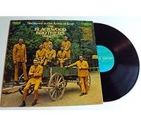 sheltered in the arms of god