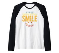 Si Ves a Alguien sin una Sonrisa, Dale la Tuya Camiseta Manga Raglan