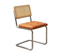 Silla de comedor de ratán moderna de mediados de siglo con respaldo tapizado y patas de metal, color naranja