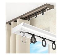 Sistema de riel de cortina con corredor silencioso y ruedas de doble eje para bloqueo de luz e instalación invisible