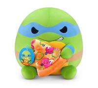 Snackles - Peluche de Tortugas Ninja Mutantes Adolescentes de ZURU, peluche cómodo con temática de Tortugas Ninja Mutantes Adolescentes y accesorio de aperitivos de pizza (Leonardo)
