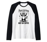 Sobreviviendo puramente por despecho Divertido Mapache Camiseta Manga Raglan