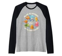 Somos Diferentes, Pero en Esta Escuela nadamos Todos Juntos Camiseta Manga Raglan