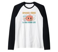 Spooky Vibes and That Nurse Life Lindo diseño de Calabaza Camiseta Manga Raglan