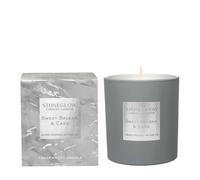 Stoneglow Luna Sweet Balsam & Cade Candle en un vaso