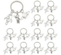 SUPERFINDINGS - Llaveros de astronauta, aleación de astronauta, cohete, colgante con colgante de tema, espacial, con anillo de astronauta, fiesta espacial para mochila, Color inoxidable, 54mm