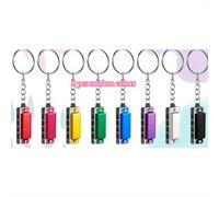 TEMU 8 Piezas de Mini Armónica Llavero - Instrumentos Portátiles de 4 Agujeros y 8 en PVC, Accesorios Musicales con Tema Anime para Fiestas Navideñas y , 8 Colores Vibrantes