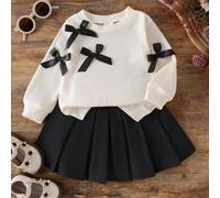 TEMU Conjunto de dos piezas para bebés niñas que una camiseta de larga con cuello con múltiples 3D negros y una falda plisada negra , ideal para exteriores.