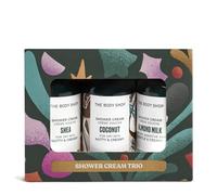 The Body Shop Juego de 3 cremas de ducha de Navidad (3 unidades de 60 ml), mini cremas de ducha festivas en karité, leche de almendras y coco, limpiadores suaves y nutritivos para piel suave, vegana