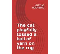 The cat playfully tossed a ball of yarn on the rug