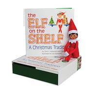 The Elf on the Shelf: Una tradición navideña (Incluye tono de piel oscura niña Elf y un libro especial en Inglés )