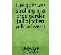 The goat was strolling in a large garden full of fallen yellow leaves