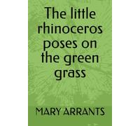 The little rhinoceros poses on the green grass
