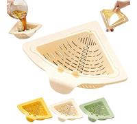 This space-saving magnetic corner sink strainer features a triangular sink drain basket that pops out automatically with a simple twist of the knob for space-saving storage. (Whinte)