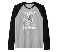 Tired Nurse Humour i Am a Nurse of Funny Nursing Camiseta Manga Raglan