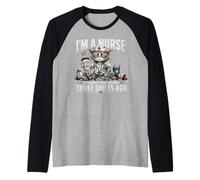 Tired Nurse Humour i Am a Nurse of Funny Nursing Camiseta Manga Raglan